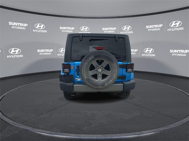 used 2015 Jeep Wrangler Unlimited car, priced at $16,795