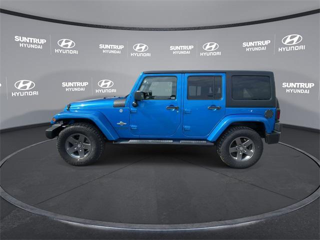 used 2015 Jeep Wrangler Unlimited car, priced at $15,593