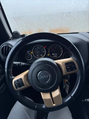 used 2014 Jeep Wrangler Unlimited car, priced at $16,900