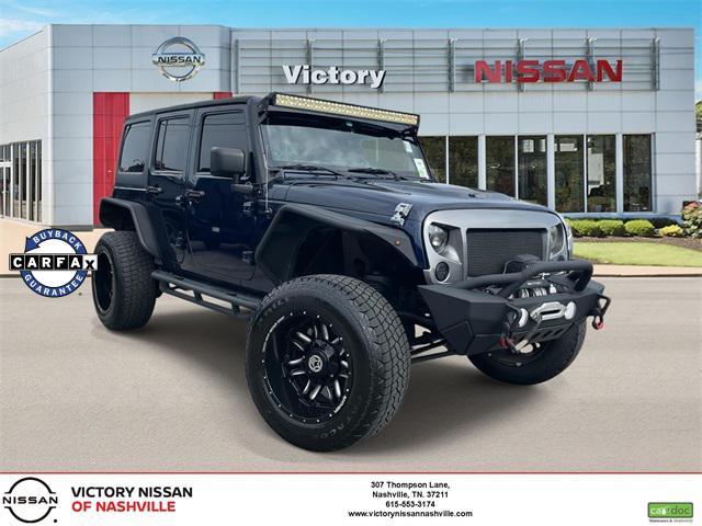 used 2013 Jeep Wrangler Unlimited car, priced at $18,390