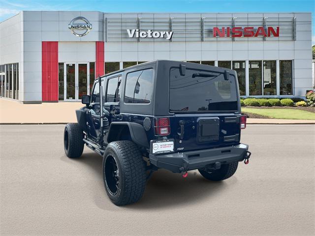 used 2013 Jeep Wrangler Unlimited car, priced at $19,590
