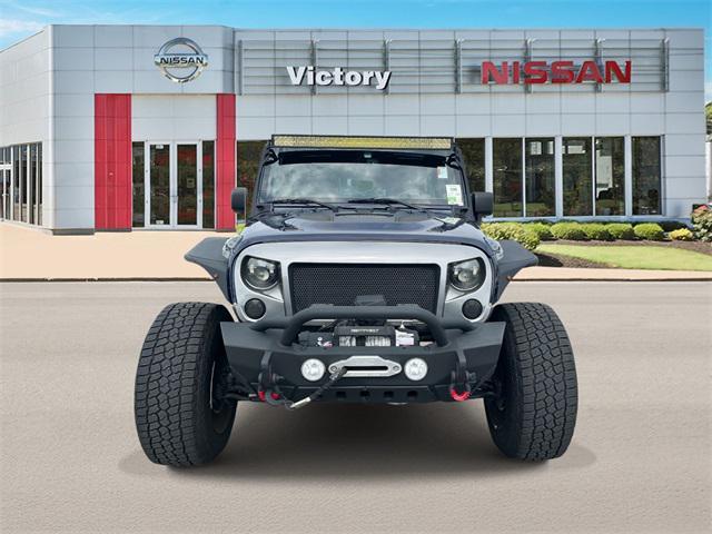 used 2013 Jeep Wrangler Unlimited car, priced at $19,590