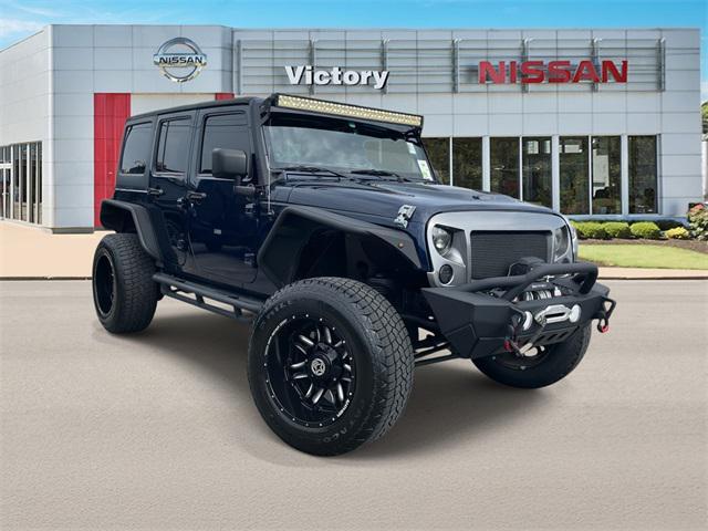 used 2013 Jeep Wrangler Unlimited car, priced at $19,590
