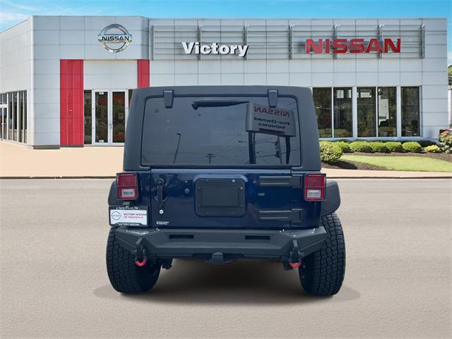 used 2013 Jeep Wrangler Unlimited car, priced at $19,590