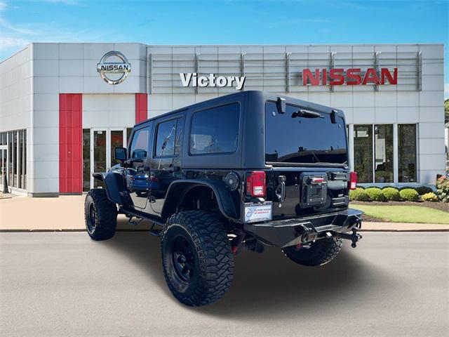 used 2013 Jeep Wrangler Unlimited car, priced at $23,890