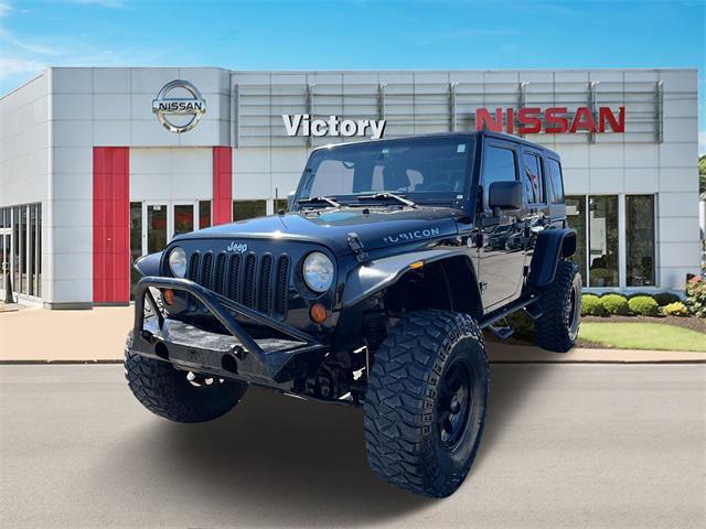 used 2013 Jeep Wrangler Unlimited car, priced at $23,890