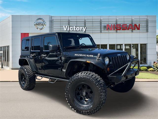 used 2013 Jeep Wrangler Unlimited car, priced at $23,890