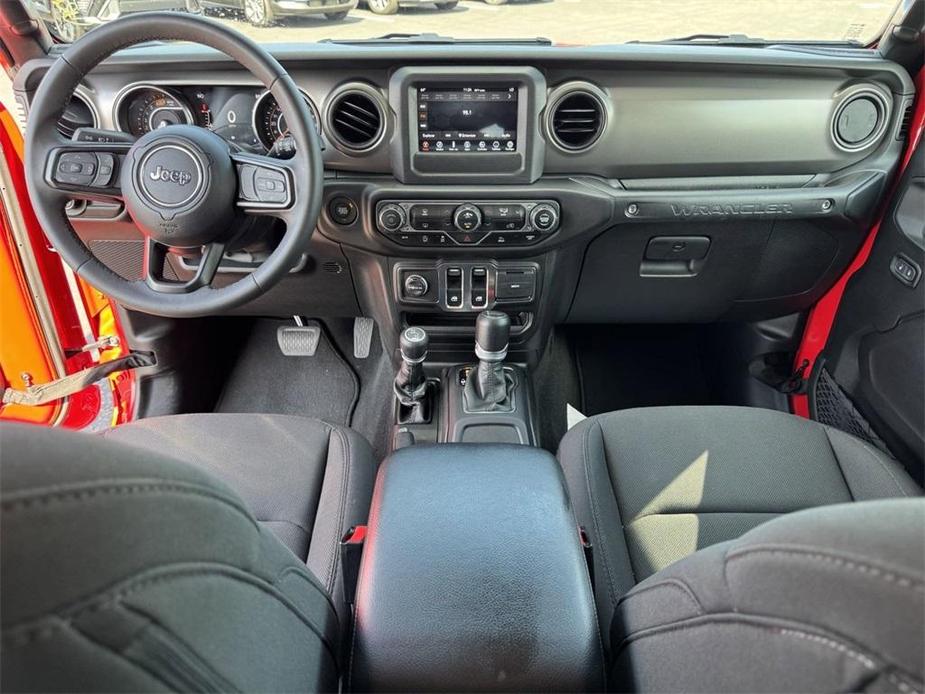 used 2023 Jeep Wrangler car, priced at $29,392