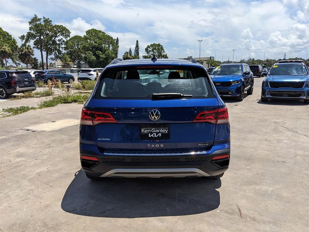 used 2023 Volkswagen Taos car, priced at $19,202