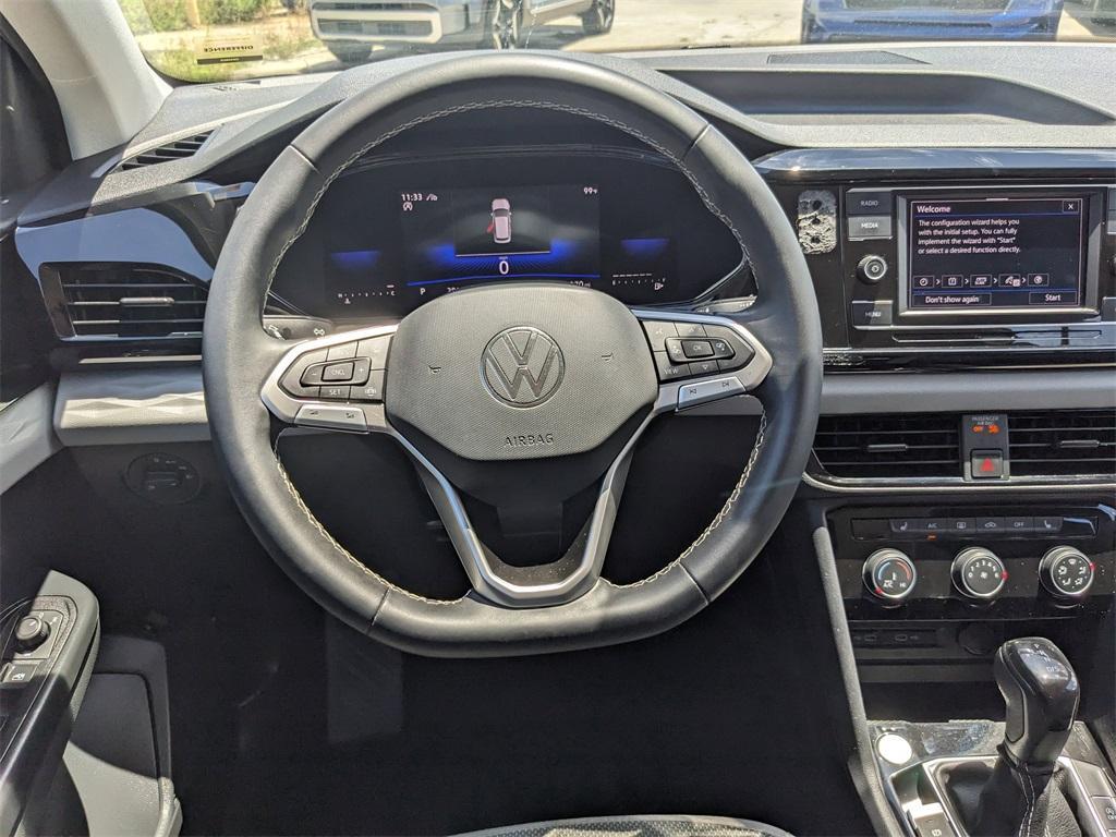 used 2023 Volkswagen Taos car, priced at $19,202