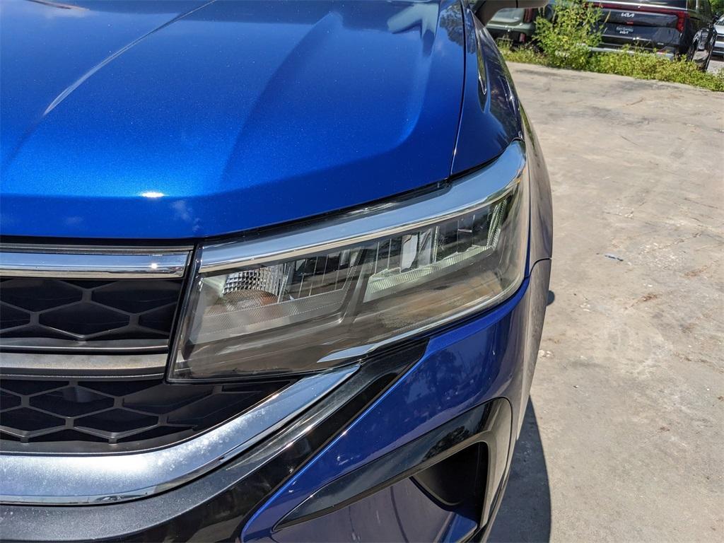 used 2023 Volkswagen Taos car, priced at $19,202