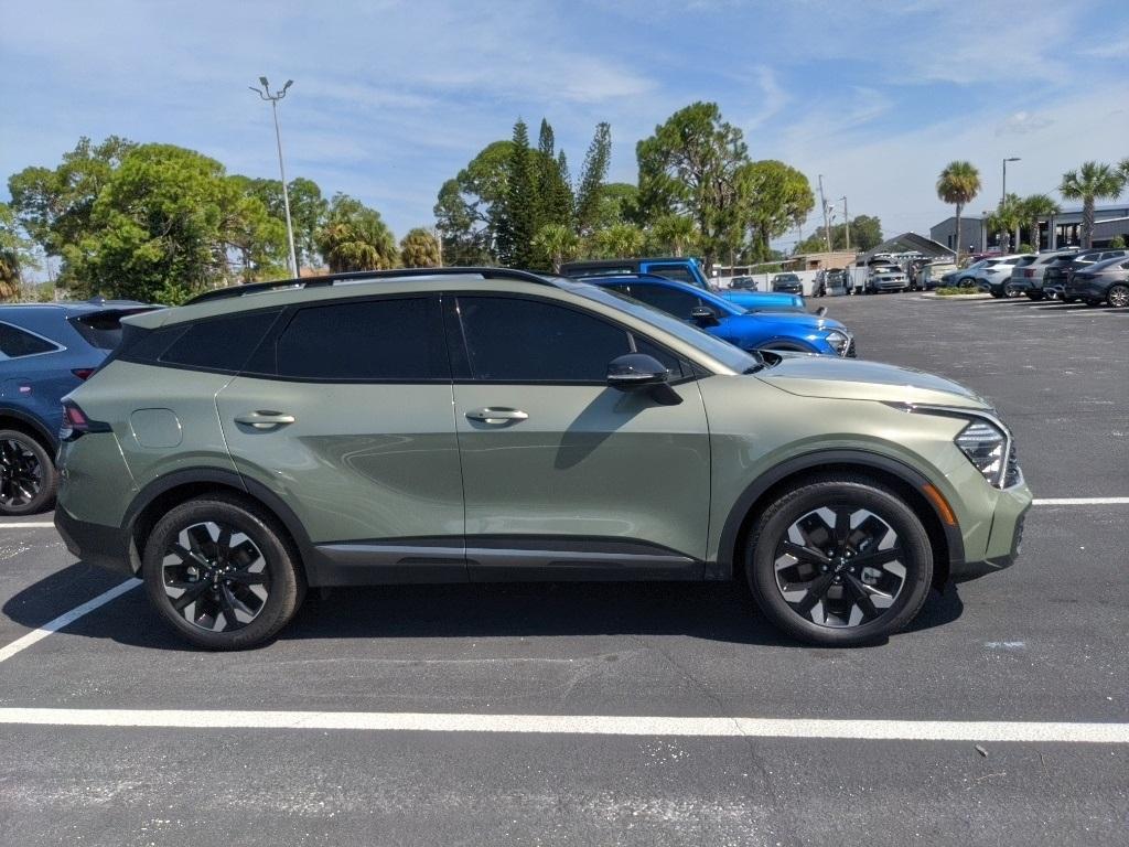 used 2024 Kia Sportage Plug-In Hybrid car, priced at $29,901