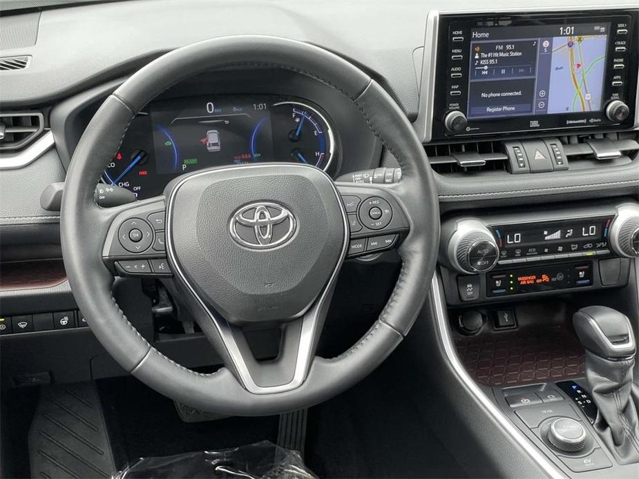 used 2021 Toyota RAV4 Hybrid car, priced at $34,995