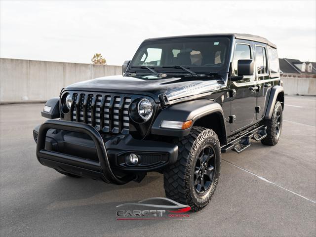 used 2021 Jeep Wrangler Unlimited car, priced at $27,444