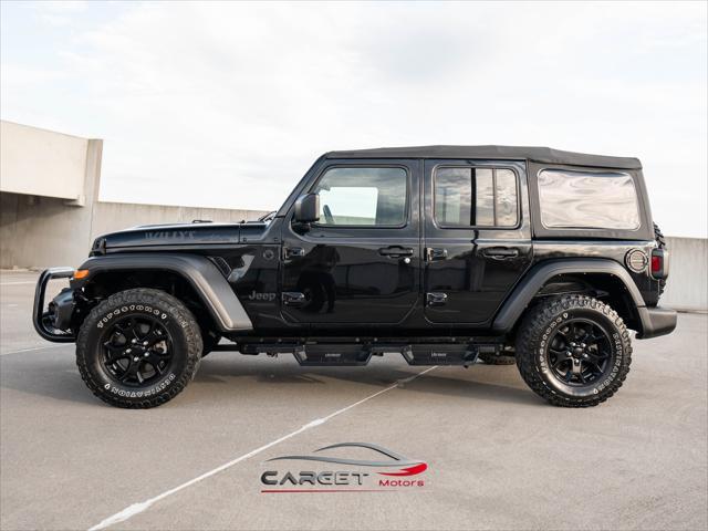 used 2021 Jeep Wrangler Unlimited car, priced at $27,444