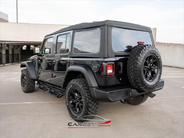 used 2021 Jeep Wrangler Unlimited car, priced at $27,444