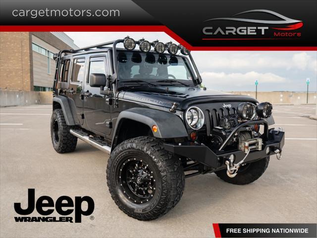 used 2011 Jeep Wrangler Unlimited car, priced at $19,997