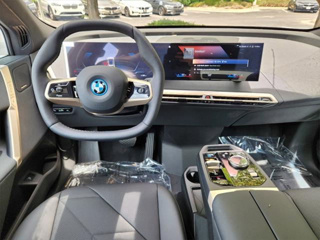 new 2024 BMW iX car, priced at $95,810