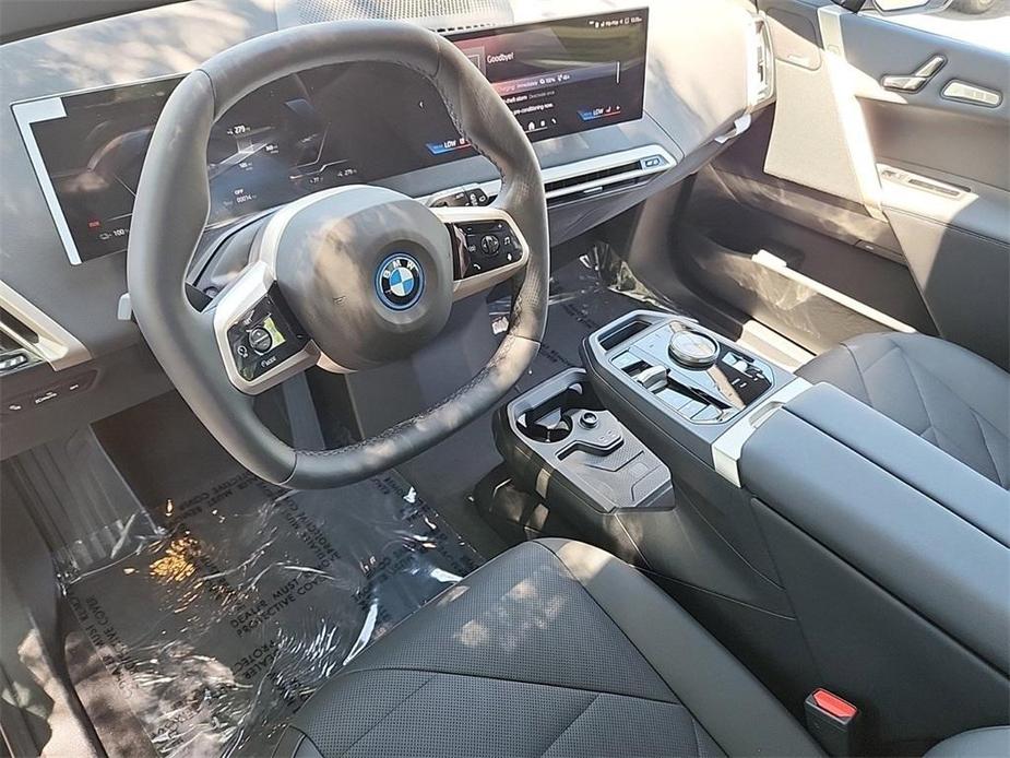 new 2024 BMW iX car, priced at $98,145