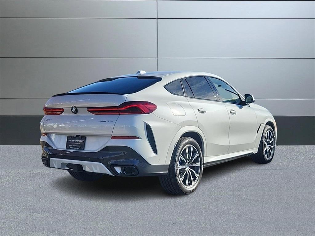 new 2025 BMW X6 car, priced at $90,125