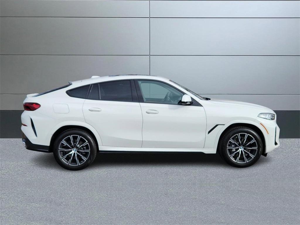 new 2025 BMW X6 car, priced at $77,225