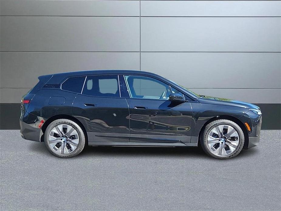 new 2025 BMW iX car, priced at $97,325