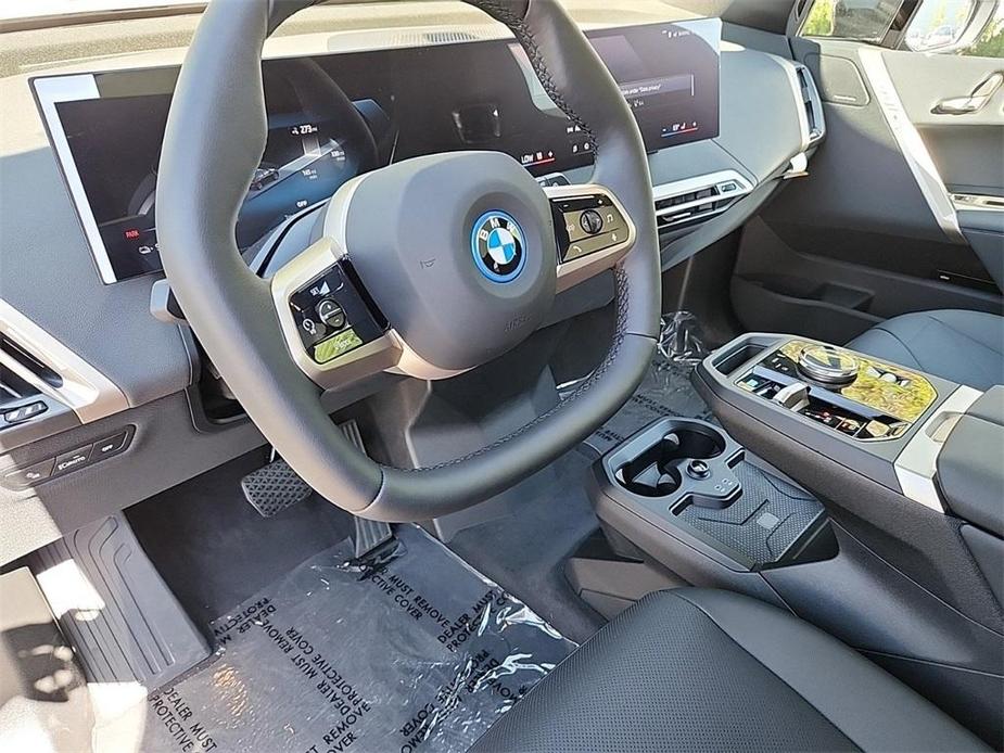 new 2025 BMW iX car, priced at $97,325