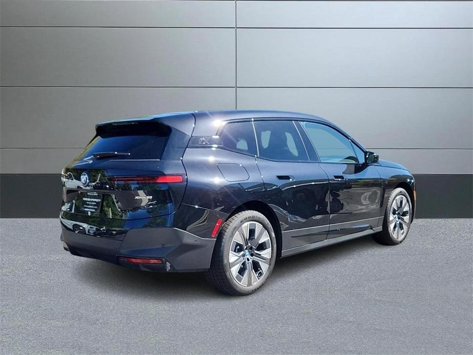 new 2025 BMW iX car, priced at $97,325