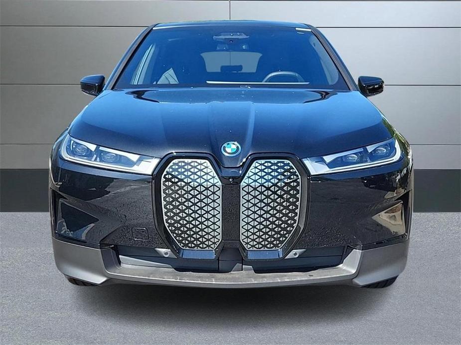 new 2025 BMW iX car, priced at $97,325