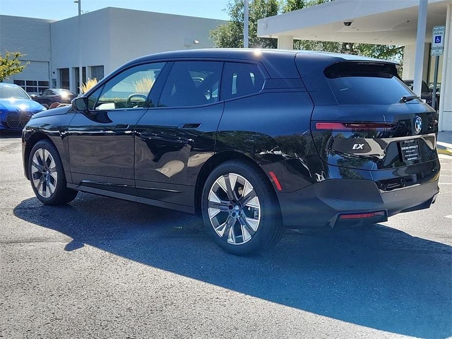 new 2025 BMW iX car, priced at $97,325