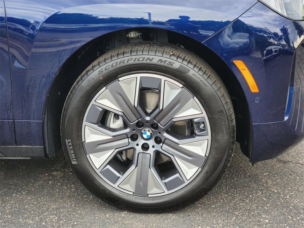 new 2026 BMW iX car, priced at $90,145