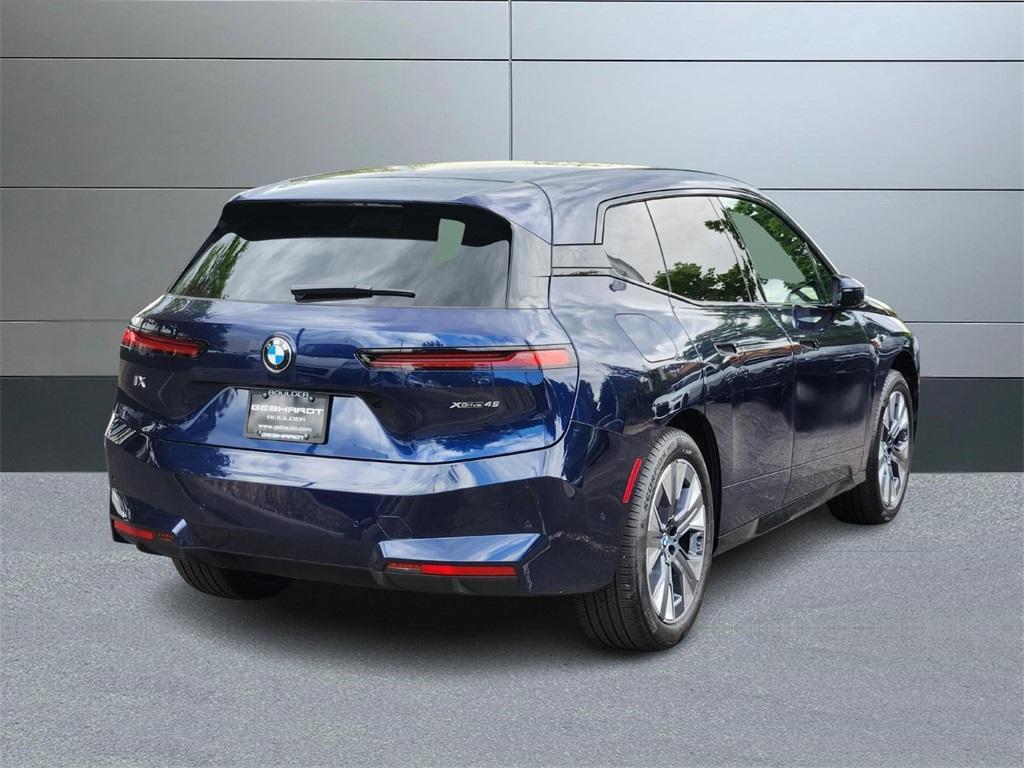 new 2026 BMW iX car, priced at $90,145