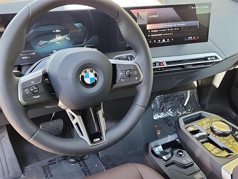 new 2025 BMW iX car, priced at $101,225