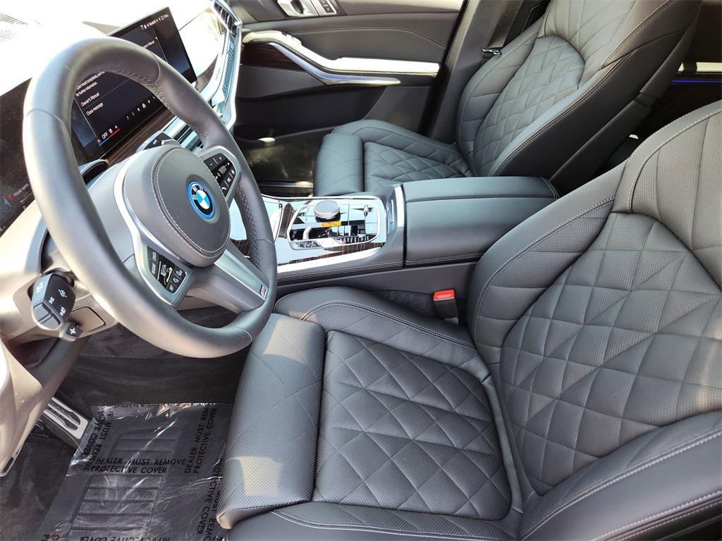 used 2025 BMW X5 PHEV car, priced at $76,897