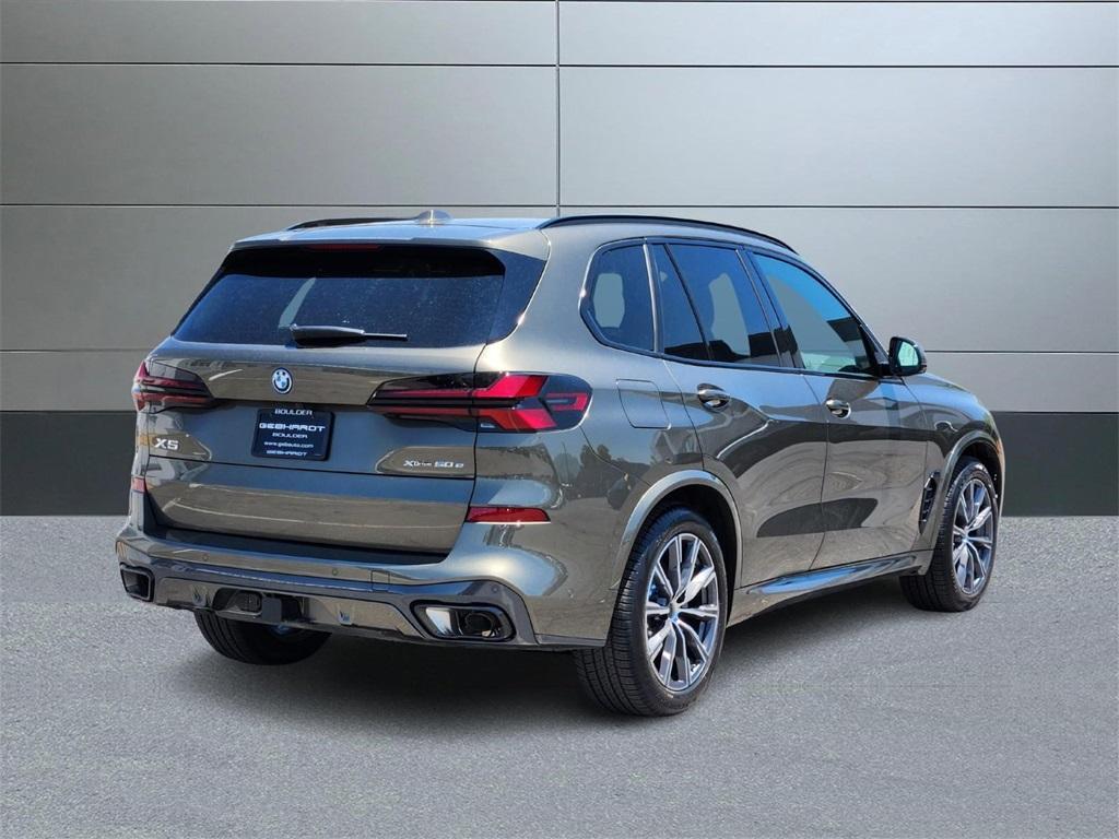 used 2025 BMW X5 PHEV car, priced at $76,897