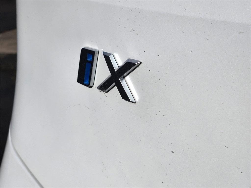 new 2024 BMW iX car, priced at $104,345