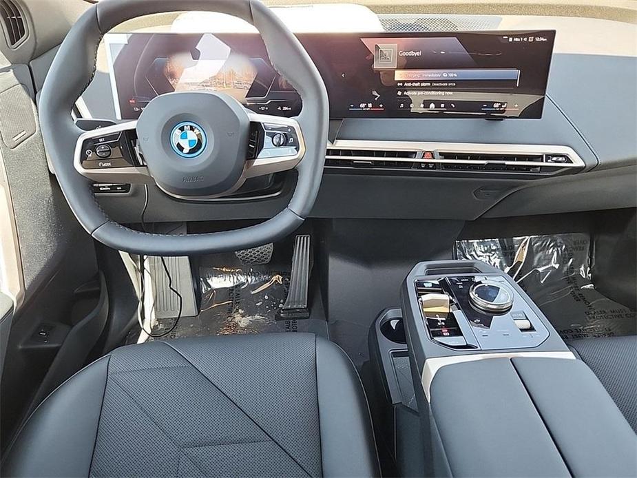 new 2024 BMW iX car, priced at $96,595