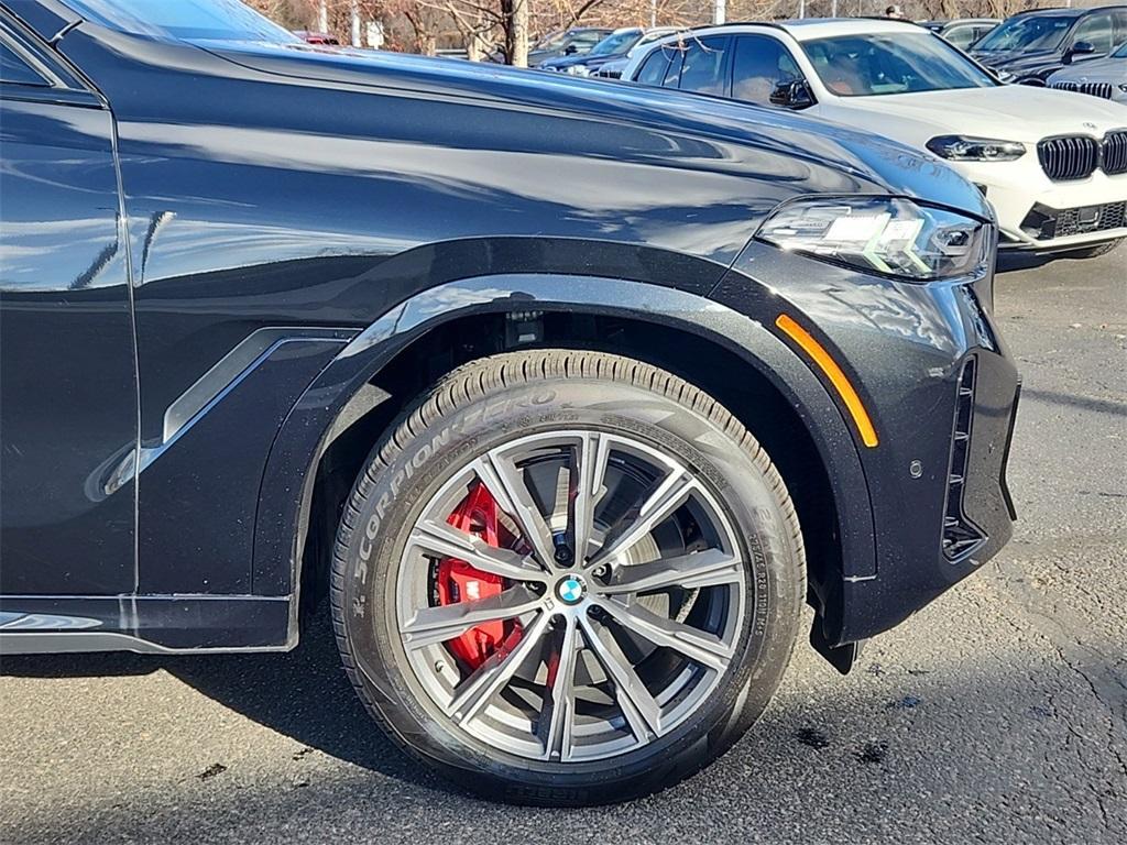 new 2025 BMW X6 car, priced at $102,475