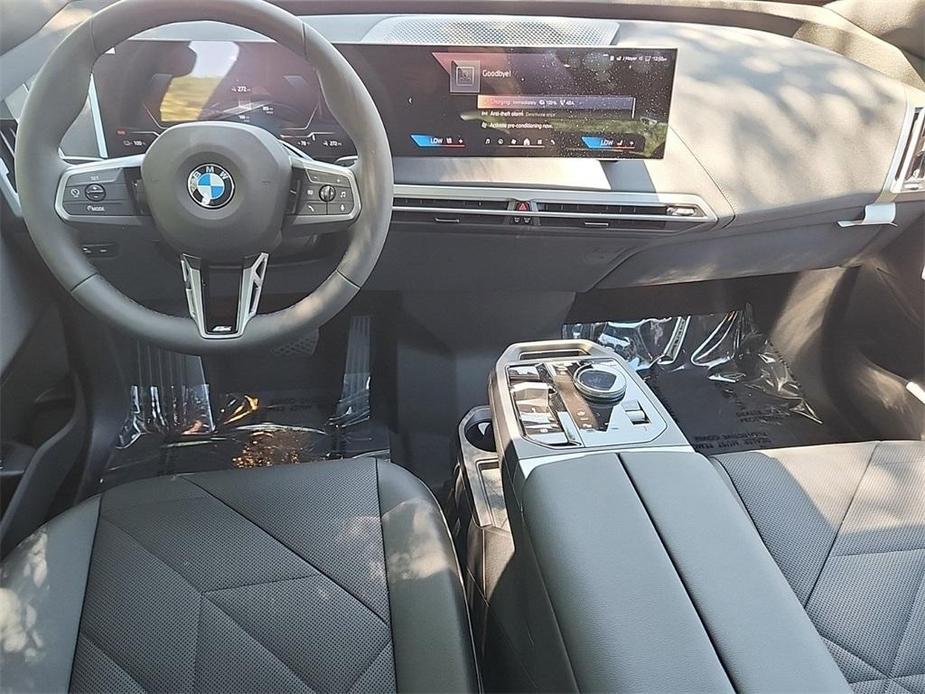 new 2025 BMW iX car, priced at $102,045