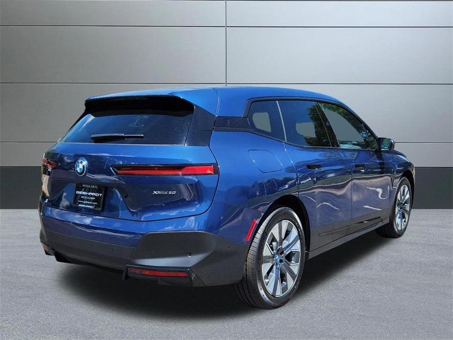 new 2024 BMW iX car, priced at $93,545
