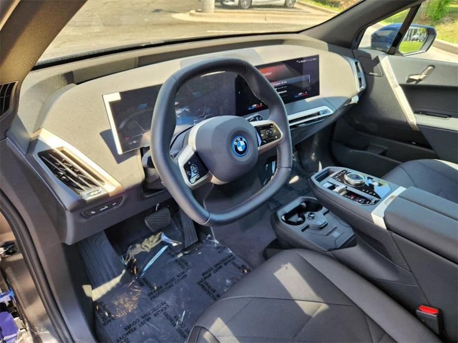 new 2024 BMW iX car, priced at $93,545