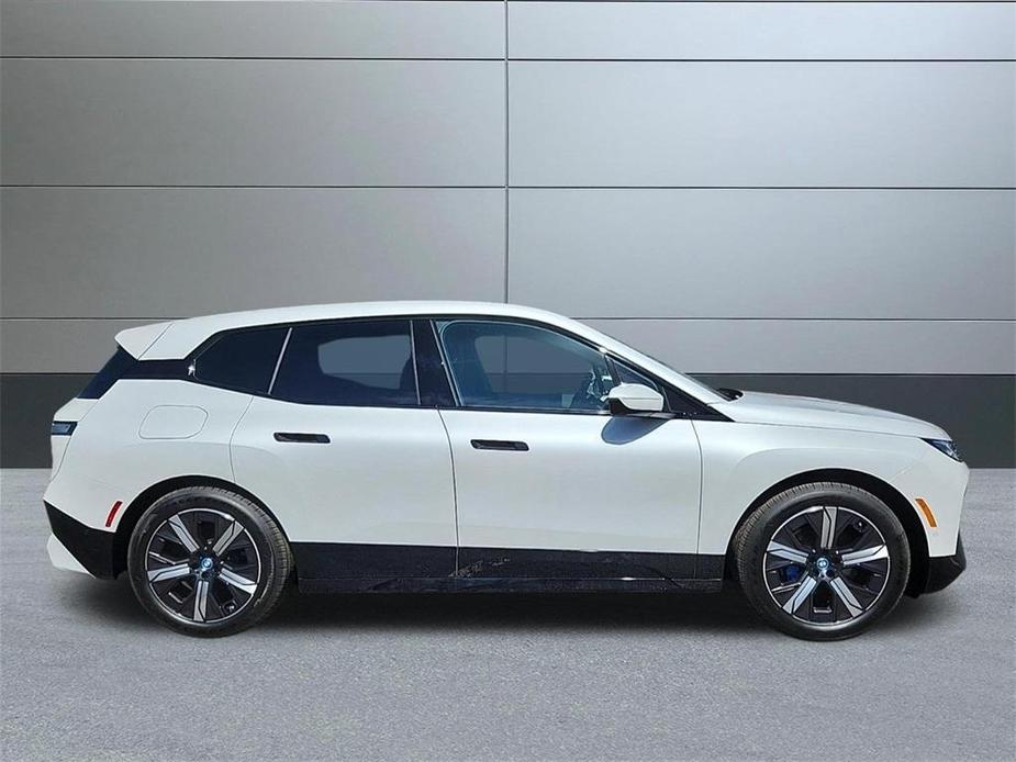 new 2024 BMW iX car, priced at $91,595