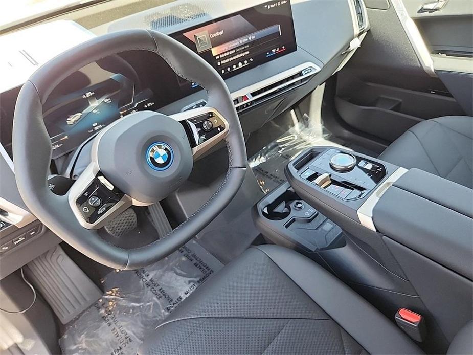 new 2024 BMW iX car, priced at $91,595