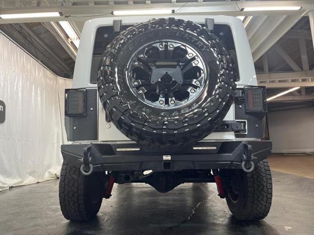 used 2013 Jeep Wrangler Unlimited car, priced at $16,995