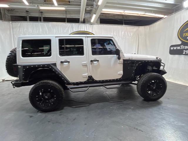 used 2013 Jeep Wrangler Unlimited car, priced at $16,995