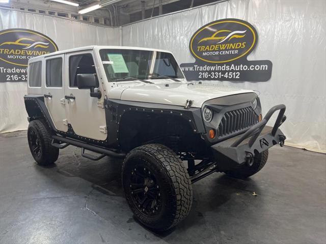 used 2013 Jeep Wrangler Unlimited car, priced at $16,995