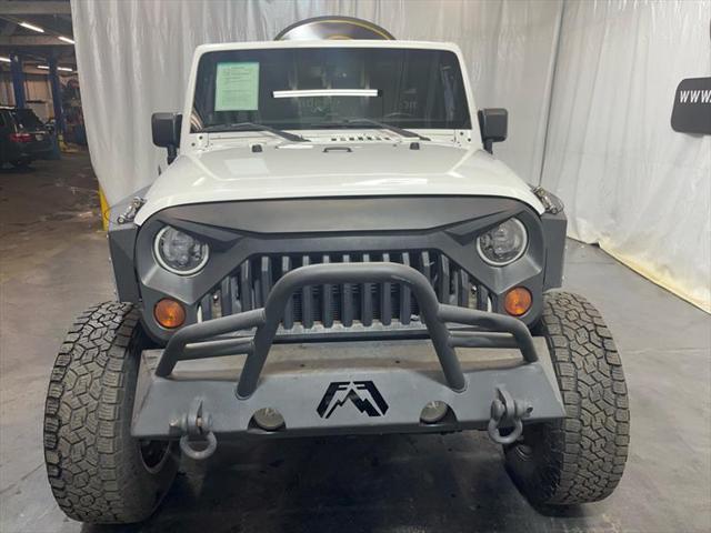 used 2013 Jeep Wrangler Unlimited car, priced at $16,995