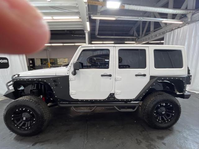 used 2013 Jeep Wrangler Unlimited car, priced at $16,995