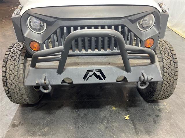 used 2013 Jeep Wrangler Unlimited car, priced at $16,995