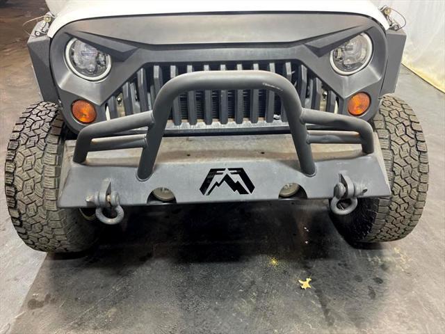 used 2013 Jeep Wrangler Unlimited car, priced at $17,995